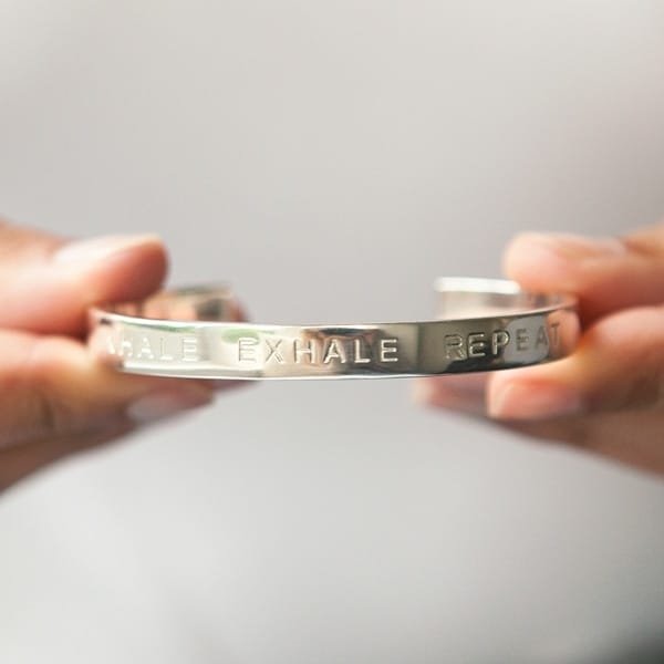 Silver Mindfulness Mantra Bangle Under the Rose