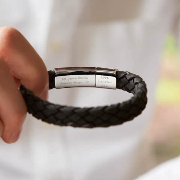 man’s black leather bracelet