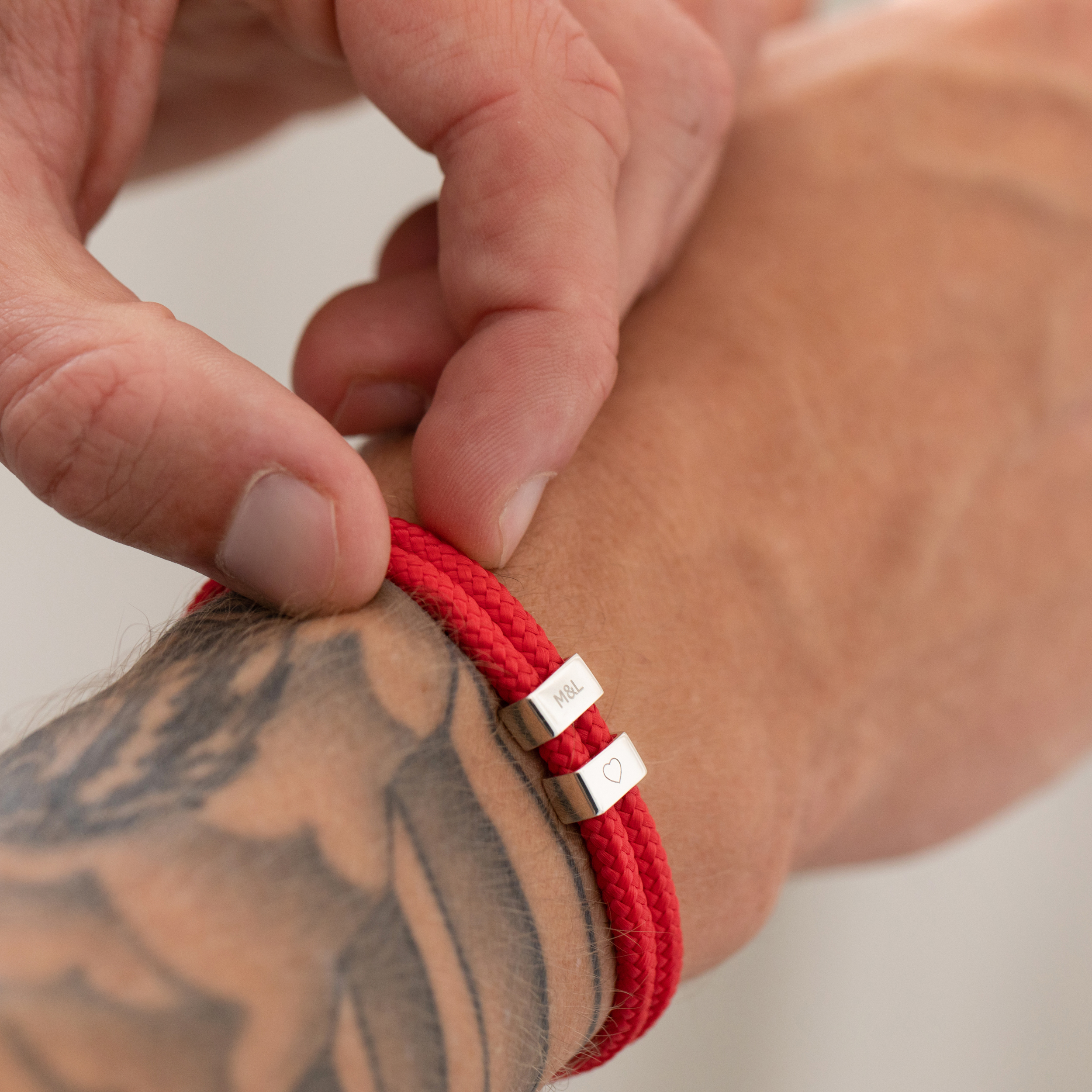 red cord men’s bracelet